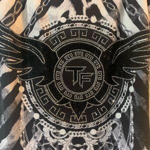 TATU dress.  Long with rhinestones.  With beautiful bottom finish.  Brand new